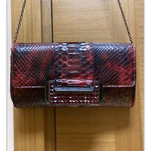 Judith Leiber clutch.